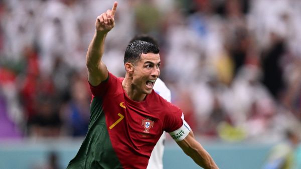Portugal's forward #07 Cristiano Ronaldo celebrates after his team's first goal during the Qatar 2022 World Cup Group H football match between Portugal and Uruguay at the Lusail Stadium in Lusail, north of Doha on November 28, 2022. (Photo by Kirill KUDRYAVTSEV / AFP)