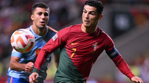 Portugal's forward Cristiano Ronaldo vies with Spain's midfielder Rodrigo Hernandez (L) during the UEFA Nations League, league A, group 2 football match between Portugal and Spain, at the Municipal Stadium in Braga on September 27, 2022. (Photo by PATRICIA DE MELO MOREIRA / AFP)