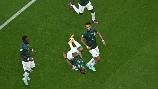 Saudi Arabia's midfielder #10 Salem Al-Dawsari celebrates after scoring his team's second goal during the Qatar 2022 World Cup Group C football match between Argentina and Saudi Arabia at the Lusail Stadium in Lusail, north of Doha on November 22, 2022. (Photo by MANAN VATSYAYANA / AFP)