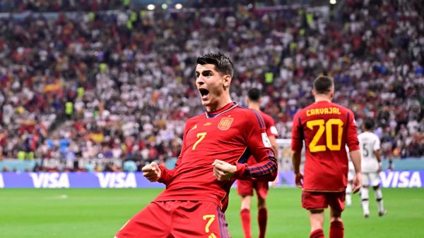 Spain's forward #07 Alvaro Morata (L) celebrates scoring his team's first goal during the Qatar 2022 World Cup Group E football match between Spain and Germany at the Al-Bayt Stadium in Al Khor, north of Doha on November 27, 2022. (Photo by JAVIER SORIANO / AFP)