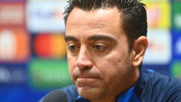 FC Barcelona's head coach Xavi looks down during a press conference in Plzen, Czech Republic, on October 31, 2022, on the eve of the UEFA Champions League Group C football match FC Viktoria Plzen v FC Barcelona. (Photo by Michal Cizek / AFP)