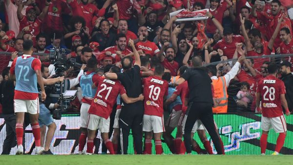 Ahly's players celebrate with the fans after winning the Egyptian Super Cup football match between Zamalek and Al-Ahly at the Hazza bin Zayed stadium in al-Ain on October 28, 2022. (Photo by Ryan LIM / AFP)