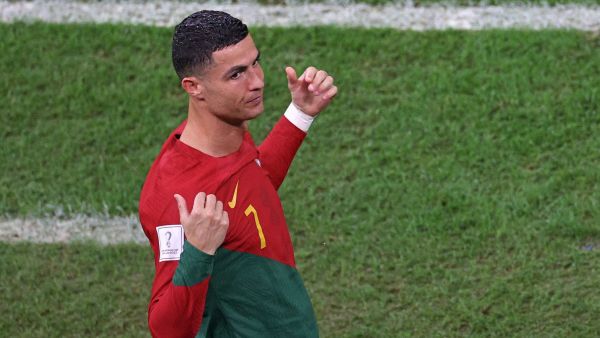 Portugal's forward #07 Cristiano Ronaldo prepares to come on during the Qatar 2022 World Cup round of 16 football match between Portugal and Switzerland at Lusail Stadium in Lusail, north of Doha on December 6, 2022. (Photo by ADRIAN DENNIS / AFP)