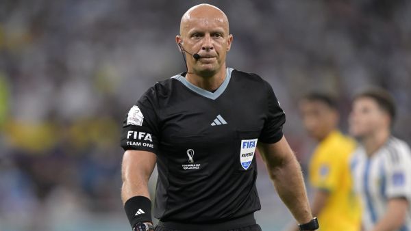 Polish referee Szymon Marciniak officiates during the Qatar 2022 World Cup round of 16 football match between Argentina and Australia at the Ahmad Bin Ali Stadium in Al-Rayyan, west of Doha on December 3, 2022. (Photo by JUAN MABROMATA / AFP)