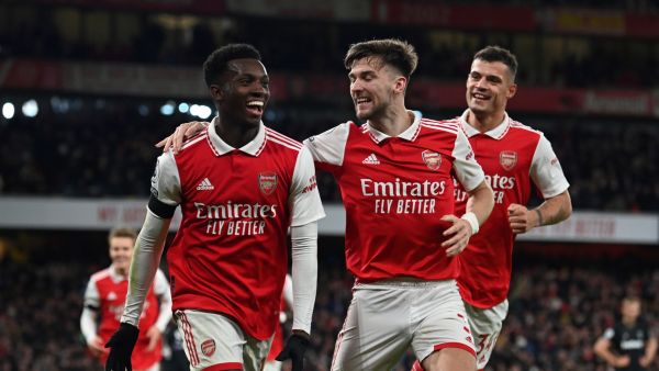 Arsenal's English striker Eddie Nketiah celebrates after scoring his team third goal during the English Premier League football match between Arsenal and West Ham United at the Emirates Stadium in London on December 26, 2022. (Photo by Glyn KIRK / AFP)
