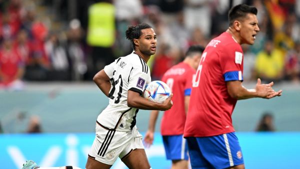 Germany's forward #10 Serge Gnabry (L) celebrates scoring his team's first goal during the Qatar 2022 World Cup Group E football match between Costa Rica and Germany at the Al-Bayt Stadium in Al Khor, north of Doha on December 1, 2022. (Photo by Raul ARBOLEDA / AFP)