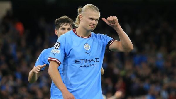 Manchester City's Norwegian striker Erling Haaland celebrates his goal during the UEFA Champions League group G football match between England's Manchester City and Germany's Borussia Dortmund at the Etihad Stadium in Manchester on September 14, 2022. (Photo by Lindsey Parnaby / AFP)
