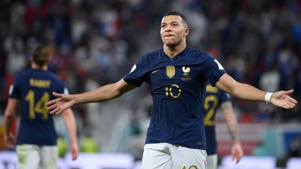 France's forward #10 Kylian Mbappe celebrates scoring his team's third goal during the Qatar 2022 World Cup round of 16 football match between France and Poland at the Al-Thumama Stadium in Doha on December 4, 2022. (Photo by FRANCK FIFE / AFP)