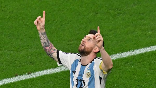 Argentina's forward #10 Lionel Messi reacts after scoring his team's first goal during the Qatar 2022 World Cup round of 16 football match between Argentina and Australia at the Ahmad Bin Ali Stadium in Al-Rayyan, west of Doha on December 3, 2022. (Photo by Glyn KIRK / AFP)