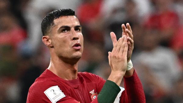 Portugal's forward #07 Cristiano Ronaldo applauds at the crowd after qualifying to the next round after defeating Switzerland 6-1 in the Qatar 2022 World Cup round of 16 football match between Portugal and Switzerland at Lusail Stadium in Lusail, north of Doha on December 6, 2022. (Photo by Anne-Christine POUJOULAT / AFP)