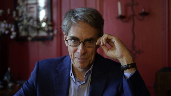 Human Rights Watch (HRW) executive director Kenneth Roth poses for a portrait in New York City on August 24, 2022. (Photo by ANGELA WEISS / AFP) Harvard University