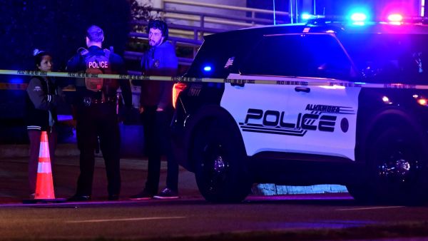 Police patrol the scene along Garvey Avenue in Monterey Park, California, on January 21, 2023, where police are responding to reports of multiple people shot. (Photo by Frederic J. BROWN / AFP) Monterey Park
