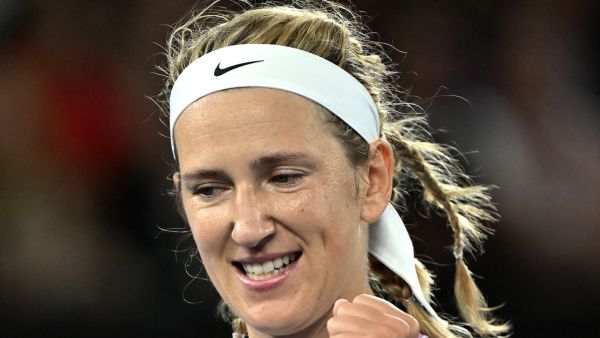 Belarus' Victoria Azarenka celebrates victory against Jessica Pegula of the US after their women's singles quarter-final match on day nine of the Australian Open tennis tournament in Melbourne on January 24, 2023. (Photo by Paul CROCK / AFP)