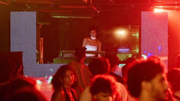 People attend a music performance by Egyptian DJ Yas Meen Selectress