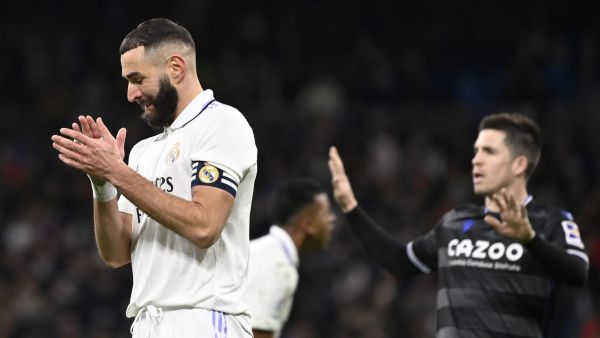 Real Madrid's French forward Karim Benzema reacts during the Spanish league football match between Real Madrid CF and Real Sociedad at the Santiago Bernabeu stadium in Madrid on January 29, 2023. (Photo by OSCAR DEL POZO / AFP)
