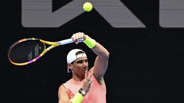 Spain's Rafael Nadal hits a return during a practice session at the Malbourne Park ahead of the Australian Open tennis tournament in Melbourne on January 15, 2023. (Photo by MANAN VATSYAYANA / AFP)