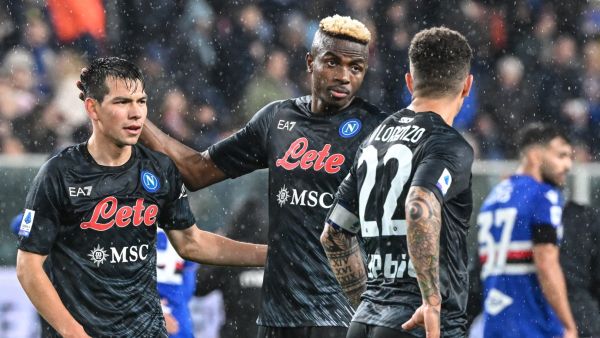 Napoli's Mexican forward Hirving Lozano (L) and Napoli's Nigerian forward Victor Osimhen react at the end of the Italian Serie A football match between Sampdoria and Napoli on January 8, 2023 at the Luigi-Ferraris stadium in Genoa. (Photo by Andreas SOLARO / AFP)