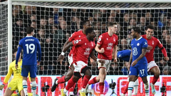 Nottingham Forest's Ivorian Coast defender Serge Aurier (C) celebrates after scoring their first goal during the English Premier League football match between Nottingham Forest and Chelsea at The City Ground in Nottingham, central England, on January 1, 2023. (Photo by Paul ELLIS / AFP)
