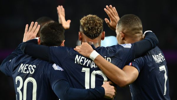 Paris Saint-Germain's Brazilian forward Neymar (C) celebrates after opening the scoring with Paris Saint-Germain's Argentine forward Lionel Messi (L) and Paris Saint-Germain's French forward Kylian Mbappe during the French L1 football match between Paris Saint-Germain (PSG) and Olympique de Marseille (OM) at the Parc des Princes Stadium in Paris, on October 16, 2022. (Photo by FRANCK FIFE / AFP)
