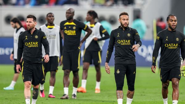 Paris Saint-Germain's Argentine forward Lionel Messi, Brazilian forward Neymar (2nd-R), and Portuguese midfielder Renato Sanches (R) walk during a team training session at Khalifa International Stadium in Doha on January 18, 2023. (Photo by Mahmoud HEFNAWY / AFP)