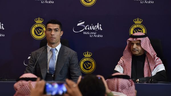 Portuguese forward Cristiano Ronaldo and President of Al-Nassr Musalli Al-Muammar attend a press conference at the Mrsool Park Stadium in the Saudi capital Riyadh on January 3, 2023, ahead of the unveiling ceremony. (Photo by AFP)