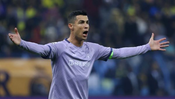 Nassr's Portuguese forward Cristiano Ronaldo reacts during the Saudi Super Cup semi-final football match between Al-Ittihad and Al-Nassr at the King Fahd Stadium in Riyadh on January 26, 2023. (Photo by Fayez NURELDINE / AFP)