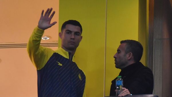 Al Nassr's Portuguese forward Cristiano Ronaldo watches from the VIP area ahead of the Saudi Pro League football match between Al-Nassr and At-Tai at the Mrsool Park Stadium in the Saudi capital Riyadh on January 6, 2023. (Photo by AFP)