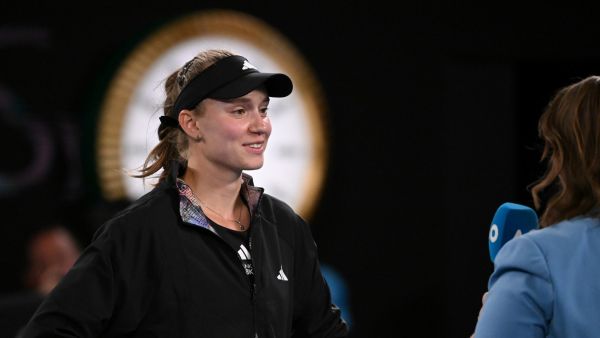 Kazakhstan's Elena Rybakina is interviewed following her win against Belarus' Victoria Azarenka during their women's singles semi-final match on day eleven of the Australian Open tennis tournament in Melbourne on January 26, 2023. (Photo by WILLIAM WEST / AFP)