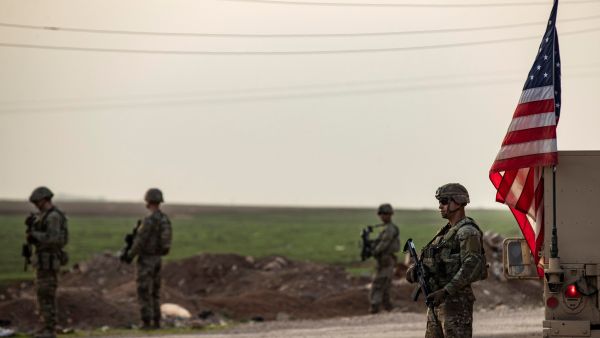 U.S. forces patrol in the vicinity of the Hori rehabilitation centre for children of suspected Islamic State (IS) group, in the town of Tel Maaruf in Syria's northeastern Hasakeh province, on December 15, 2022. (Photo by Delil SOULEIMAN / AFP) ISIS leader