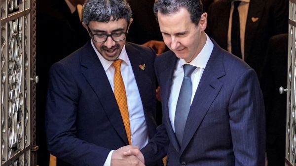 A handout picture released by the official Syrian Arab News Agency (SANA) shows (R to L) Syria's President Bashar al-Assad meeting with the UAE's Foreign Minister Sheikh Abdullah bin Zayed al-Nahyan in the capital Damascus on January 4, 2023. (Photo by SANA / AFP) $50 million