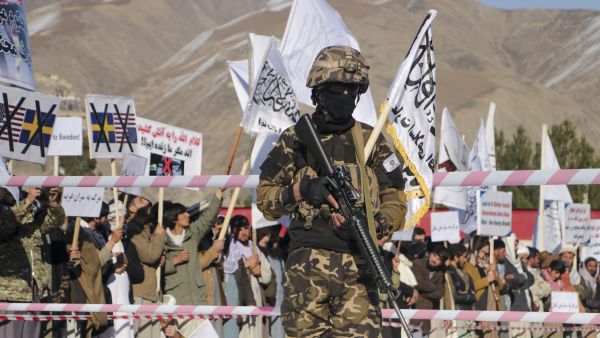 Taliban security forces stand guard as Afghans protest against the burning of the Koran by Swedish-Danish far-right politician Rasmus Paludan, after Friday prayers in Fayzabad of Badakhshan province on January 27, 2023. (Photo by OMER ABRAR / AFP) ISIS commander