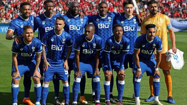 Hilal's players pose for a group picture ahead of the FIFA Club World Cup second round football match between Morocco's Wydad AC and Saudi Arabia's Al-Hilal at the Prince Moulay Abdellah Stadium in Rabat on February 4, 2023. (Photo by Fadel SENNA / AFP)