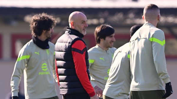 AC Milan's Italian coach Stefano Pioli supervises a training session on February 13, 2023 at the Milanello Sports Center in Carnago, northwest of Milan, on the eve of the UEFA Champions League round of 16 football match between AC Milan and Tottenham Hotspur. (Photo by Marco BERTORELLO / AFP)