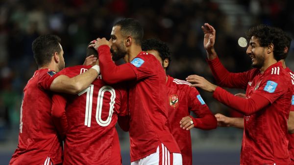 Ahly's Egyptian forward Mohamed Sherif (2nd-L) celebrates with teammates after scoring their second goal during the FIFA Club World Cup first round football match between Egypt's Al-Ahly and New Zealand's Auckland City at the Ibn Batouta Stadium in Tangier on February 1, 2023. (Photo by Fadel Senna / AFP)