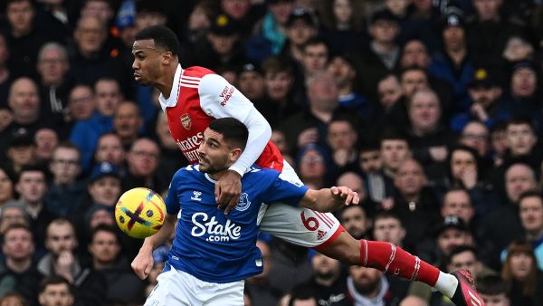 Arsenal's Brazilian defender Gabriel Magalhaes (back) heads the ball with Everton's French striker Neal Maupay during the English Premier League football match between Everton and Arsenal at Goodison Park in Liverpool, north-west England, on February 4, 2023. (Photo by Paul ELLIS / AFP) 