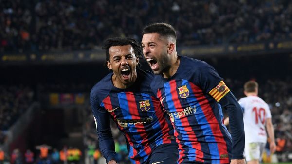 Barcelona's Spanish defender Jordi Alba celebrates after scoring his team's first goal during the Spanish league football match between FC Barcelona and Sevilla FC at the Camp Nou stadium in Barcelona, on February 5, 2023. (Photo by Josep LAGO / AFP)