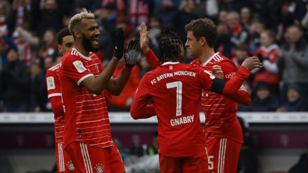 Bayern Munich's German forward Thomas Mueller (R) celebrates scoring his team's first goal with (from L) Bayern Munich's German midfielder Jamal Musiala, Bayern Munich's Cameroonian forward Eric Maxim Choupo-Moting and Bayern Munich's German midfielder Serge Gnabry during the German first division Bundesliga football match between FC Bayern Munich and VfL Bochum 1848 in Munich, southern Germany on February 11, 2023. (Photo by MICHAELA REHLE / AFP)