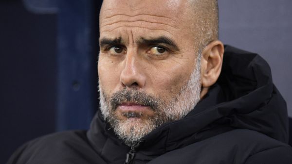 Manchester City's Spanish manager Pep Guardiola attends the English FA Cup fourth round football match between Manchester City and Arsenal at the Etihad Stadium in Manchester, northwest England, on January 27, 2023. (Photo by Oli SCARFF / AFP)