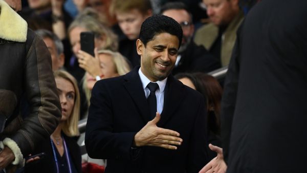 Paris Germain's Qatari president Nasser Al-Khelaïfi is greeted before the French L1 football match between Paris Saint-Germain (PSG) and OGC Nice at The Parc des Princes Stadium in Paris on October 1, 2022. (Photo by FRANCK FIFE / AFP)
