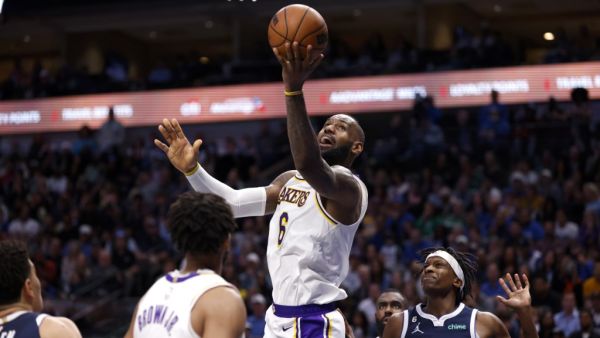LeBron James #6 of the Los Angeles Lakers puts up a shot and scores against the Dallas Mavericks in the second half at American Airlines Center on February 26, 2023 in Dallas, Texas. The Lakers won 111-108. Ron Jenkins/Getty Images/AFP (Photo by Ron Jenkins / GETTY IMAGES NORTH AMERICA / Getty Images via AFP)