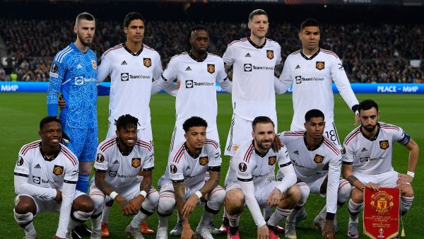 Manchester United's players pose for a team picture before the start of the UEFA Europa League round of 32 first-leg football match between FC Barcelona and Manchester United at the Camp Nou stadium in Barcelona, on February 16, 2023. (Photo by Josep LAGO / AFP)