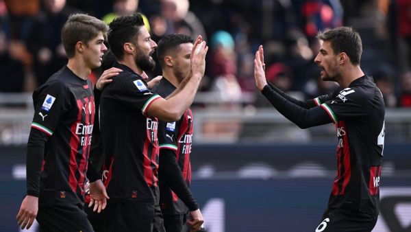 AC Milan's French forward Olivier Giroud (2ndL) celebrates with teammates after scoring during the Italian Serie A football match between AC Milan and Sassuolo, at the San Siro stadium in Milan, on January 29, 2023. (Photo by MIGUEL MEDINA / AFP)