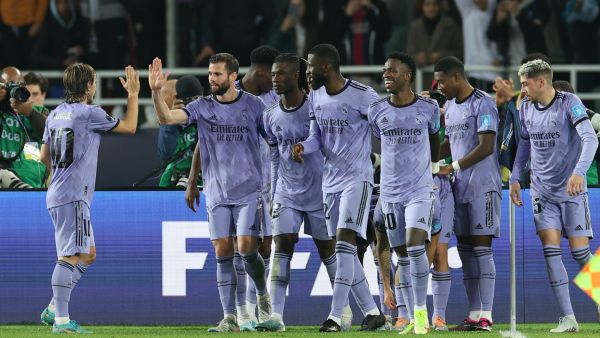 Real Madrid's players celebrate their third goal during the FIFA Club World Cup semi-final football match between Egypt's Al-Ahly and Spain's Real Madrid at the Prince Moulay Abdellah Stadium in Rabat on February 8, 2023. (Photo by FADEL SENNA / AFP)
