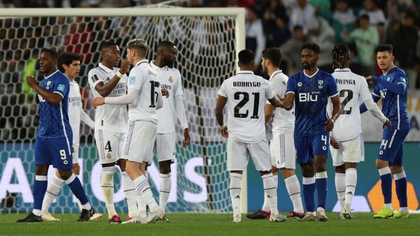 Players greet one another at the end of the FIFA Club World Cup final football match between Spain's Real Madrid and Saudi Arabia's Al-Hilal at the Prince Moulay Abdellah Stadium in Rabat on February 11, 2023. (Photo by Fadel Senna / AFP)