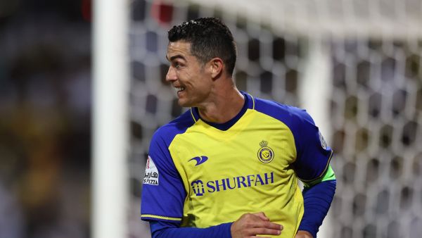 Nassr's Portuguese forward Cristiano Ronaldo celebrates scoring his team's second goal during the Saudi Pro League football match between Al-Wehda and Al-Nassr at the King Abdulaziz Stadium in Mecca on February 9, 2023. (Photo by AFP)