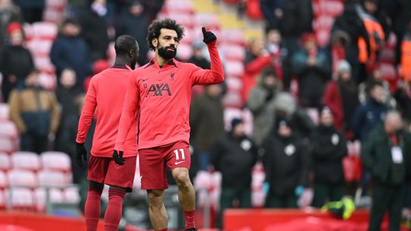 Liverpool's Egyptian striker Mohamed Salah reacts as he warms-up prior to the English Premier League football match between Liverpool and Chelsea at Anfield in Liverpool, north west England on January 21, 2023. (Photo by Paul ELLIS / AFP)