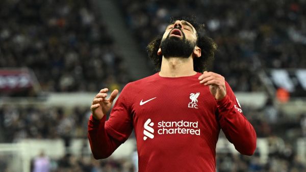 Liverpool's Egyptian striker Mohamed Salah reacts after missing to score during the English Premier League football match between Newcastle United and Liverpool at St James' Park in Newcastle-upon-Tyne, north east England on February 18, 2023. (Photo by Oli SCARFF / AFP)