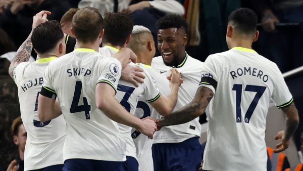Tottenham Hotspur's Brazilian defender Emerson Royal (2R) celebrates scoring the opening goal during the English Premier League football match between Tottenham Hotspur and West Ham United at Tottenham Hotspur Stadium in London, on February 19, 2023. (Photo by Ian Kington / AFP)