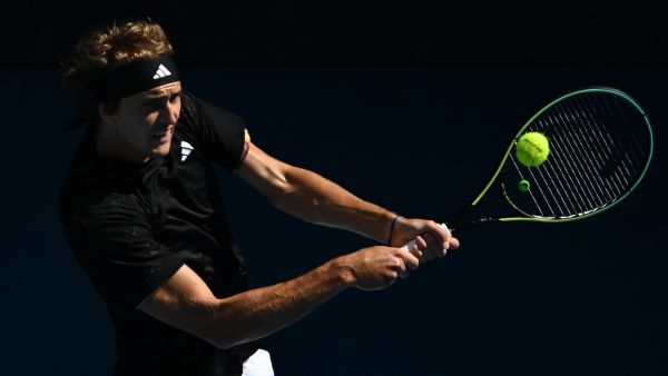 Germany's Alexander Zverev hits a return against Michael Mmoh of the US during their men's singles match on day four of the Australian Open tennis tournament in Melbourne on January 19, 2023. (Photo by Manan VATSYAYANA / AFP)