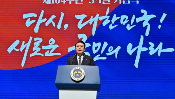 South Korea's President Yoon Suk Yeol speaks during a ceremony marking the 104th anniversary of the March 1st Independence Movement Day against Japanese colonial rule, in Seoul on March 1, 2023. (Photo by JUNG YEON-JE / POOL / AFP) South Korea